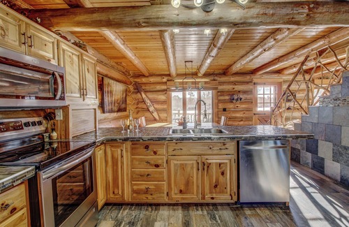 Nevis House | Serene Log Home Getaway with Lake View and Water Toys
