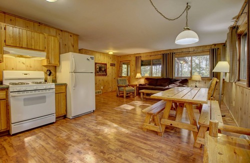 Lac du Flambeau Cabin | Pet-Friendly Lakeside Cabin with Private Dock & Hot Tub
