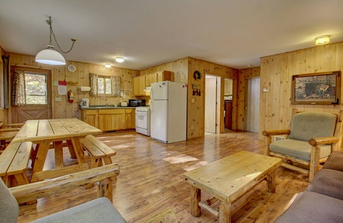 Lac du Flambeau Cabin | Pet-Friendly Lakeside Cabin with Private Dock & Hot Tub
