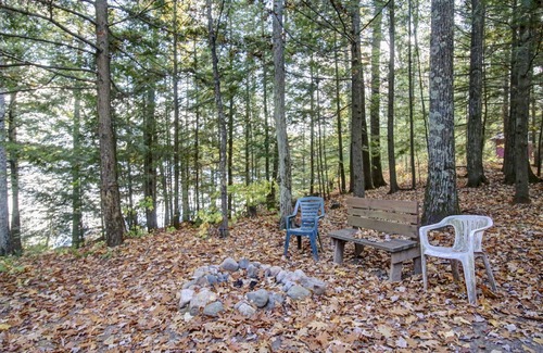 Lac du Flambeau Cabin | Pet-Friendly Lakeside Cabin with Private Dock & Hot Tub