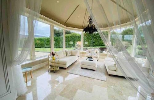 Blessington Villa | Serene Lakeview Lodge Home with Hot Tub & Oceanfront Bliss