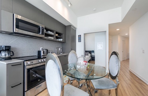 King West Village Apartment | Beautiful Lakeview Penthouse with Family & Pet Amenities