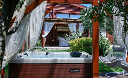 Thermi Villa | Discover Lakkia - Wooden Residence with Spa & Hot Tub