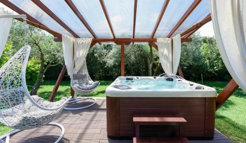 Thermi Villa | Discover Lakkia - Wooden Residence with Spa & Hot Tub