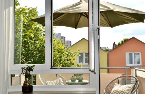 Renningen Apartment | Elegant Design Oase: Central Location with Kitchen & Pool