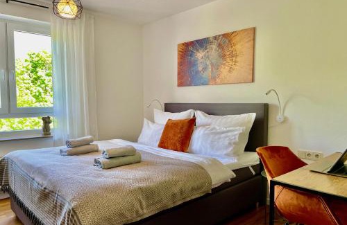 Renningen Apartment | Elegant Design Oase: Central Location with Kitchen & Pool