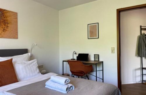 Renningen Apartment | Elegant Design Oase: Central Location with Kitchen & Pool
