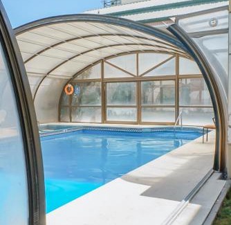 Neuquen Hotel | Relax at Land Express Neuquén with Pool and Hot Tub