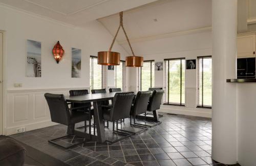Ouddorp Villa | Indulge at Langedijk 2 - Ouddorp: Hot Tub & Comfort Await