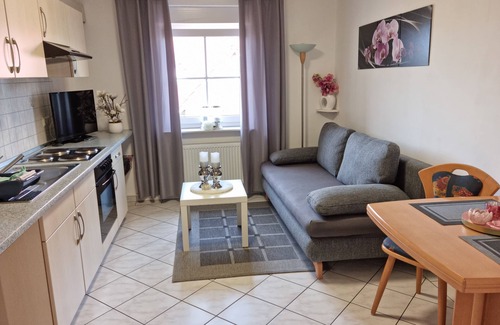 Norddeich Apartment | Cozy Windlicht Vacation Apartment with Pool & Family Amenities