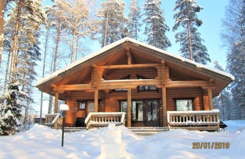 Puumala Ski Chalet | Experience Lappalaisen lomamökit Norpparanta's Private Beach