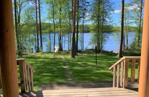 Puumala Ski Chalet | Experience Lappalaisen lomamökit Norpparanta's Private Beach