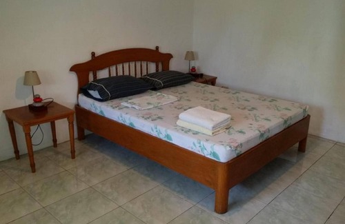 Basak House | Relax at Lapu Lapu Cottages with Pool & Spa Amenities