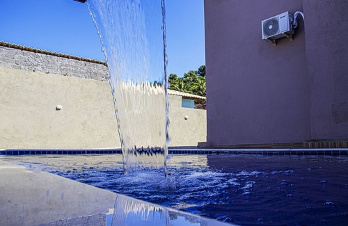 Taperapua Beach Apartment | Relax at Lar Doce Mar: Poolside Homes Steps from the Beach