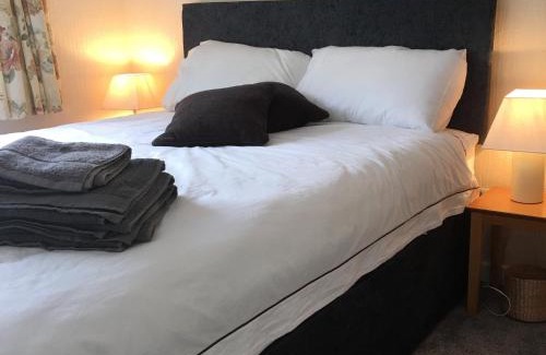 Newcastle House | Discover Larch Lodge: Pet-Friendly 4-Star Retreat