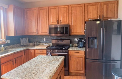 Ames House | Spacious 4-Bedroom Retreat in West Ames - Rated 10/10