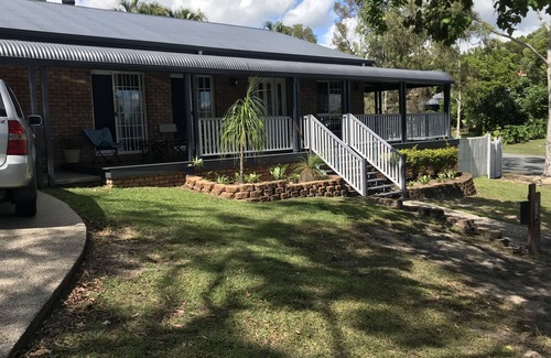Robina House | Inviting Colonial Queenslander Home with Pool for All Groups