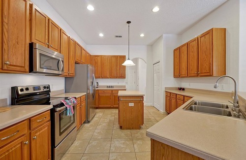 Calabria House | Spacious 4-Bedroom Pool Home with Scenic Conservation Views