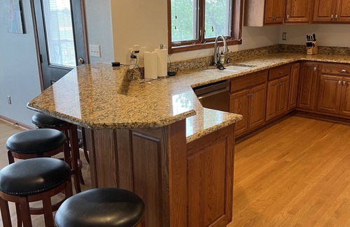 Boone House | Spacious Golf Course Home near ISU with Pool & Family Fun