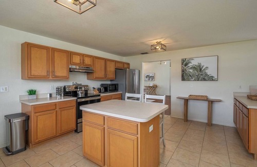 Lakeland House | Relaxing King Bed Suite with Fireside Hot Tub Access