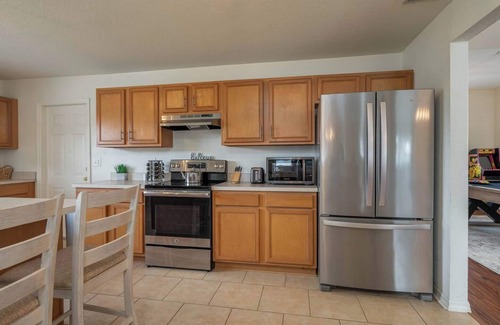 Lakeland House | Relaxing King Bed Suite with Fireside Hot Tub Access