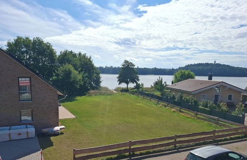 Krakow am See House | Inviting House on Lake Krakow with Boat, Jetty & Pool