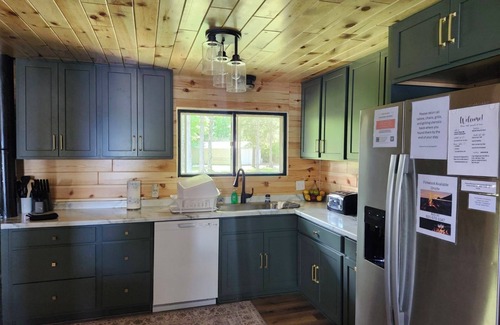 Mercer House | Pet-Friendly Lake House on Scenic Snowmobile Trail