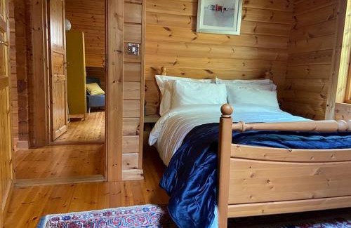 Ballyconnell House | Inviting Ocean View Log Cabin Getaway - 4-Star Rated