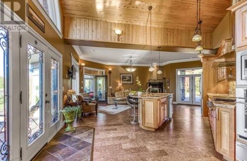 Azilda House | Elegant Waterfront Lakeview Estate with Pool and Breakfast