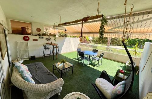 Playa de San Juan Apartment | Relaxed Terrace with Golf Views and Family-Friendly Amenities