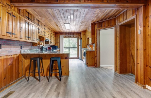 McCalla House | Ideal Stone Home Near UA with Pool & Pet-Friendly Amenities