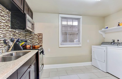 Uptown Historic District Apartment | Exceptional Uptown Apartment with Spa and Family Amenities