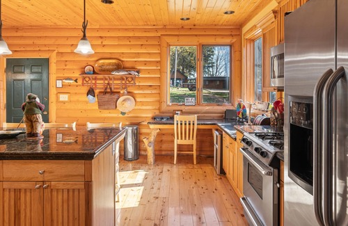 Ripon House | Woodsy Retreat with Breathtaking Sunset Views on Green Lake