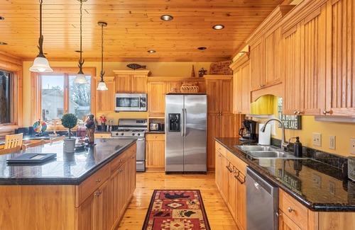 Ripon House | Woodsy Retreat with Breathtaking Sunset Views on Green Lake