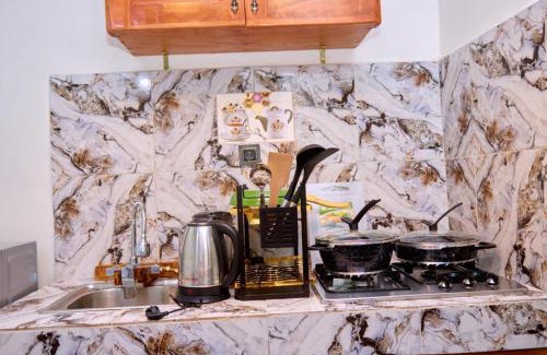 Douala Apartment | Top-Rated Larissa Home Bonapriso: Child-Friendly Stay