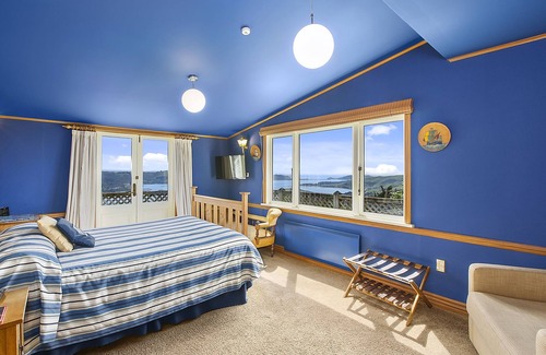 Dunedin Cabin | Discover Larnach Lodge: 4-Star Stay with Family Amenities