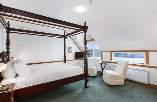 Dunedin Cabin | Discover Larnach Lodge: 4-Star Stay with Family Amenities