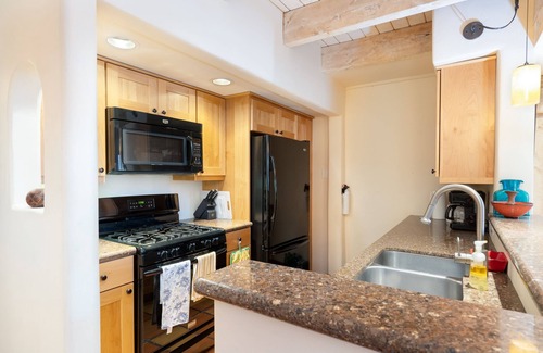 South Capitol Condo | Discover Las Brisas 24: Cozy Downtown Condo with Fireplace