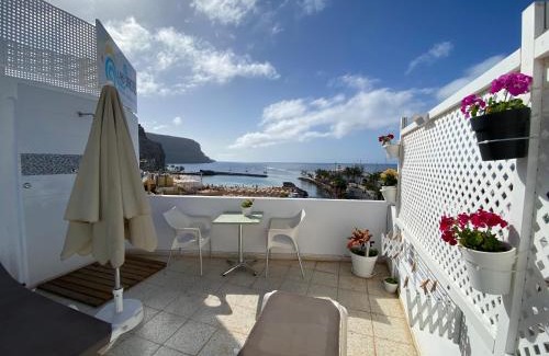 Lomo Quiebre Apartment | Oceanfront Las Brisas Mogan Apartamentos with Family Amenities