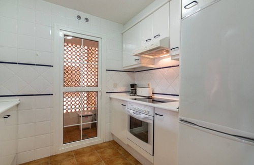 Punta del Moral Apartment | Discover Las Dunas with Ocean View & Poolside Bliss