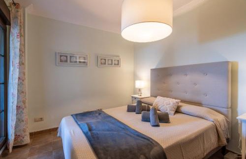 Punta del Moral Apartment | Relax at Las Palmeras by Ĥ: Poolside Family Retreat