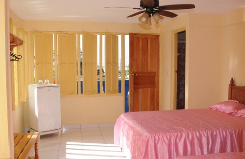 Baracoa Hotel | Discover Las Palmeras: Ocean View with Spa & Family-Friendly