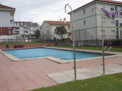 San Miguel de Meruelo Apartment | Family-Friendly Retreat at Las Palmeras with Pool Access