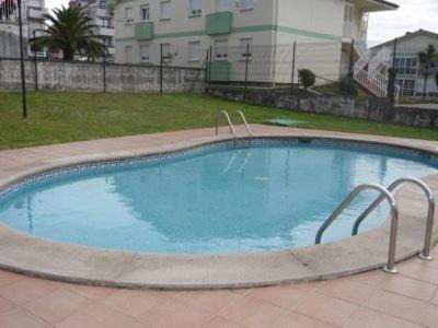 San Miguel de Meruelo Apartment | Family-Friendly Retreat at Las Palmeras with Pool Access