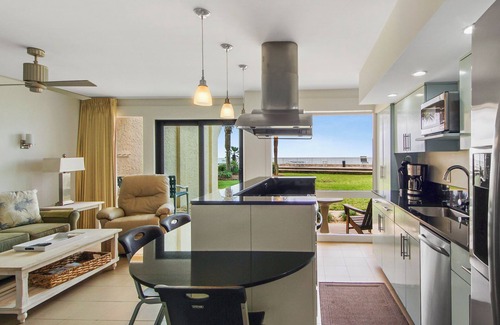 Fort Bay Condo | Latitude 29: Oceanfront Retreat with Breakfast Included