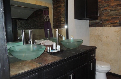 Norman Apartment | Inviting Lavender Suite at Whispering Pines Inn Awaits You