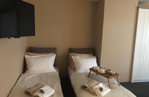 Pernik Apartment | Lavender Suite: Pet-Friendly Oasis with Ocean Views