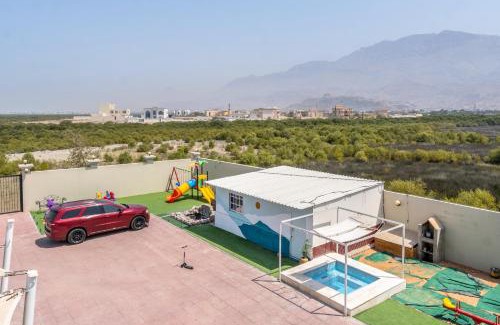Ras Al Khaimah House | Explore Lazeemah Chalet: Oceanfront Retreat with Hot Tub