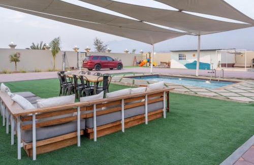 Ras Al Khaimah House | Explore Lazeemah Chalet: Oceanfront Retreat with Hot Tub