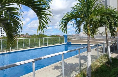 Portal do Sol Apartment | Beachfront Escape: Pool & Fun with High-Speed WiFi